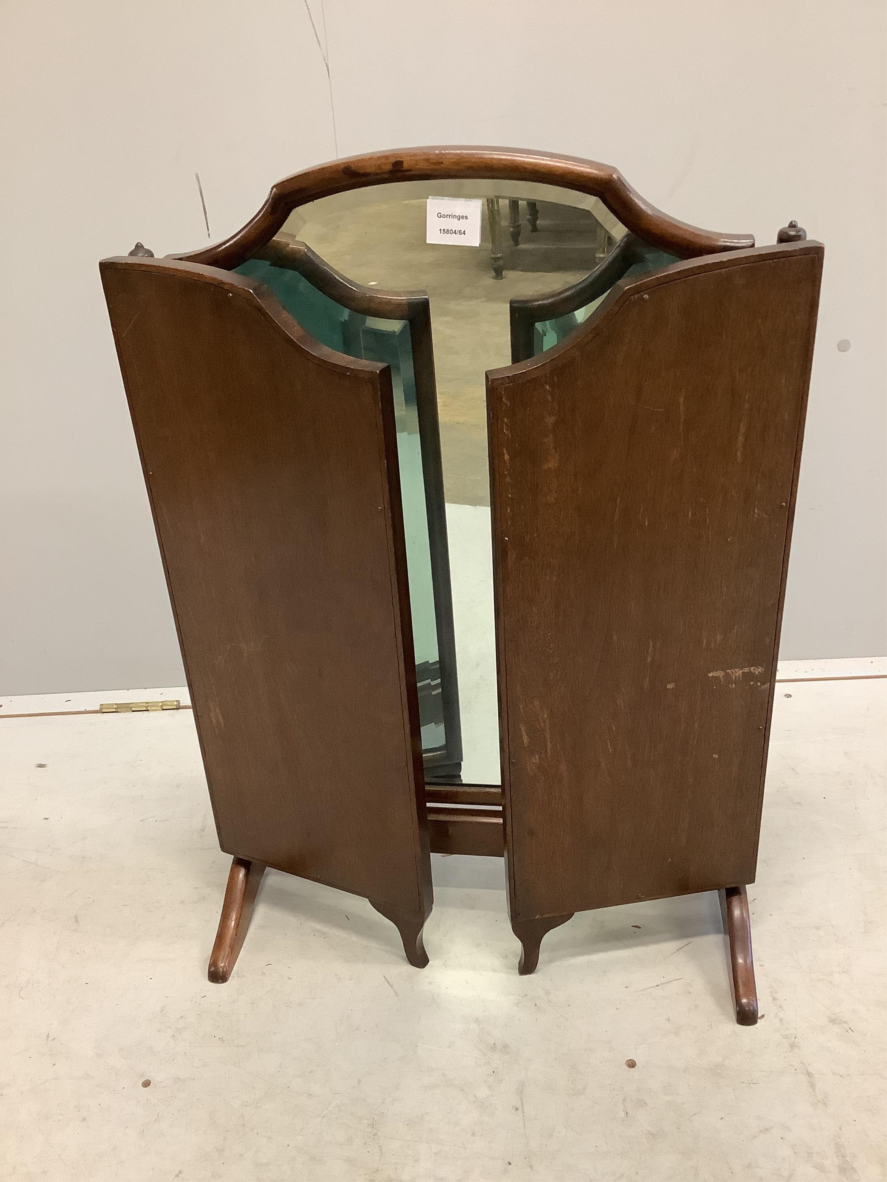 A Queen Anne revival walnut triple plate toilet mirror, height 75cm. Condition - fair